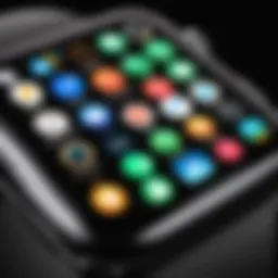 Close-up view of the Apple Watch touch screen displaying various apps